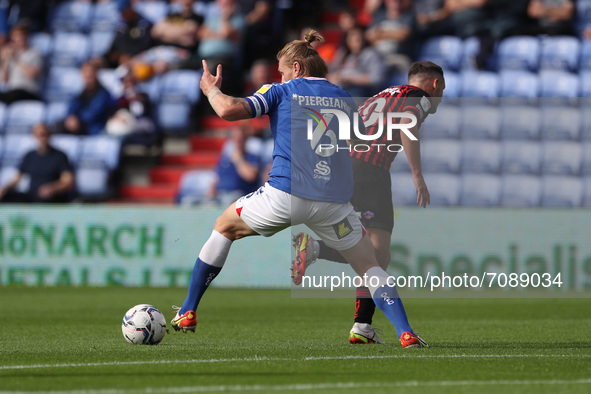 Carl Piergianni of Oldham Athletic wins the ball from Luke Molyneux of Hartlepool United  during the Sky Bet League 2 match between Oldham A...