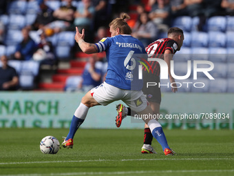 Carl Piergianni of Oldham Athletic wins the ball from Luke Molyneux of Hartlepool United  during the Sky Bet League 2 match between Oldham A...