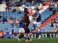  Hartlepool United's Zaine Francis-Angol wins a header against Zak Dearnley of Oldham Athletic during the Sky Bet League 2 match between Old...