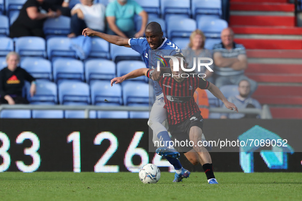 Oldham Athletic's Dylan Bahamboula battles for possession with Hartlepool United's Jamie Sterry  during the Sky Bet League 2 match between O...