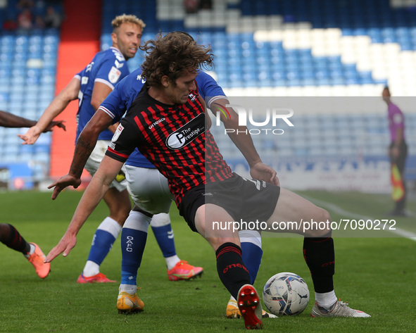  Hartlepool United's Reagan Ogle in action with Jordan Clarke during the Sky Bet League 2 match between Oldham Athletic and Hartlepool Unite...