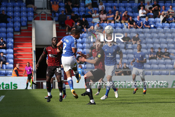  Jordan Clarke of Oldham Athletic contests a header with Hartlepool United's David Ferguson during the Sky Bet League 2 match between Oldham...