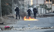 Clashes between anti-regime protesters and riot police after preventing the rally in the a...