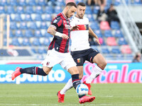 Marko Arnautovic (Bologna F.C.) (left) competes for the ball with Mattia Bani (Genoa CFC) during the Italian Serie A soccer match Bologna F....