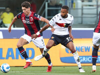 Aaron Hickey (Bologna F.C.) (left) competes for the ball with Hernani (Genoa CFC) during the Italian Serie A soccer match Bologna F.C. vs Ge...