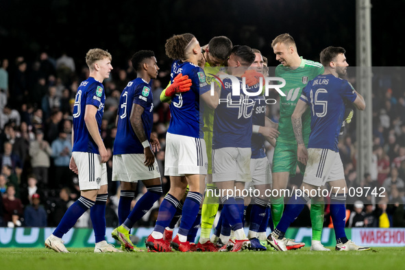 Players of Leeds United greet their goalkeeper Illan Meslier after the Carabao Cup match between Fulham and Leeds United at Craven Cottage,...