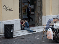 Two men are sleeping at Monastiraki square in the center of Athens, Greece on September 22, 2021. (