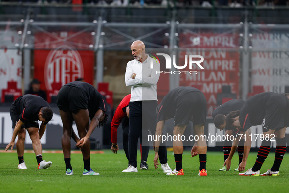 Stefano Pioli (AC Milan) talks to his players during warm up during the Italian football Serie A match AC Milan vs Venezia FC on September 2...