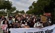 Hundreds of activists and members of the community marched in favor of the ecology and aga...