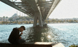 People spending time near the Golden Horn (Halic) Bridge in Istanbul, Turkey seen on Septe...