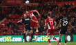 Sheffield United's Billy Sharp contests a header with Middlesbrough's Dael Fry during the...