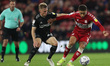 Sheffield United's Ben Osborn battles for possession with Middlesbrough's Marcus Tavernier...