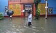 The water luggage’s KOlkata Amar Street    under heavy rain from Cyclone Komen in Kolkata...
