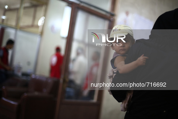 Douma, Syria, on 2nd August, 2015.
A child is seen in the vaccine's center belongs to the Syrian Arab Red Crescent - Douma branch, to get h...