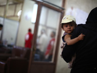 Douma, Syria, on 2nd August, 2015.
A child is seen in the vaccine's center belongs to the Syrian Arab Red Crescent - Douma branch, to get h...