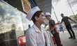 Kitchen helpers take a break outside a fast food restaurant in Dohuk / Summer 2013. 