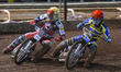 Jack Holder  (Red) forces his way past Richie Worrall  (Yellow) during the SGB Premiershi...