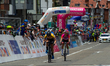 Participants pass through the finish line during the last stage finals of the Vuelta a Col...
