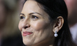 Priti Patel MP, Home Secretary, watches Johnson's speech on day four of the Conservative P...