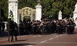 Band members of the Royal Regiment of Canadian Artillery march from Buckingham Palace to W...