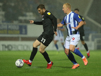    Ryan Cooney of Morecambe and Mark Cullen of Hartlepool United in action during the EFL Trophy match between Hartlepool United and Morecam...