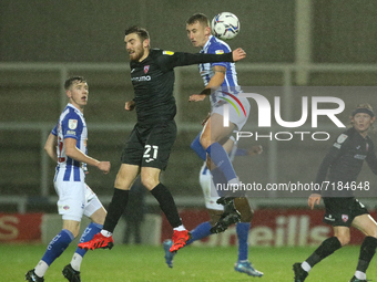    Ryan Cooney of Morecambe and David Ferguson of Hartlepool United in action during the EFL Trophy match between Hartlepool United and More...