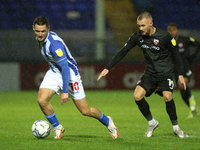    Luke Molyneux of Hartlepool United and Shane McLoughlin of Morecambe in action during the EFL Trophy match between Hartlepool United and...
