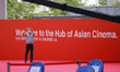 A Visitor take a picture to  works prepare the opening ceremony of the 26th Busan Internat...
