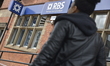 A person passing a branch of the Royal Bank of Scotland in Manchester on Tuesday 4th Augus...
