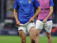 Federico Chiesa of Italy warms up during the UEFA Nations League Finals 2021 semi-final football match between Italy and Spain at Giuseppe M...