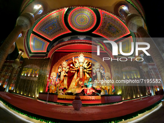 An idol of the Goddess Durga is seen on a makeshift place of worship on the occasion of Durga Puja festival in Kolkata on October 9, 2021....
