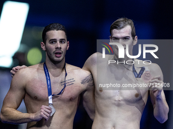 Balázs Holló 2nd and Hubert Kós 3rd of Hungary after in the Men's 400m Individual Medley on the FINA Swimming World Cup held at Duna Arena S...