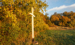 Big wooden Catholic cross at the forest edge is seen in Oslonino, Poland on 10 October 202...