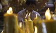 Oct 10, 2021, The Vegetarian Festival: Shrine staff place candles for people who come to w...