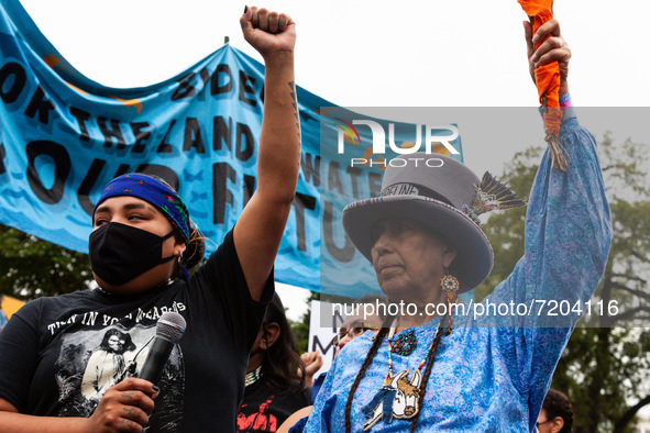 Native American activists lead a protest at the White House against the continued use of fossil fuels on Indigenous Peoples' Day, the first...