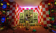 A priest is seen in worship of an idol of Goddess Durga at a pandal , during Durga puja fe...