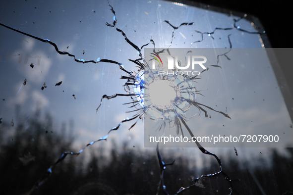 Bullet-ridden window pane of a residential house where two militants were killed during an encounter between Indian forces and Kashmiri mili...
