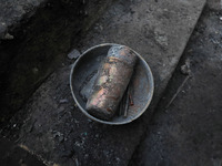 The damaged utensils lie on the floor inside the damaged residential house where a gun battle took place between Indian forces and Kashmiri...