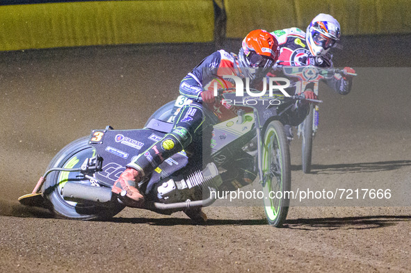 
Craig Cook (Red) leads Steve Worrall   (White) during the SGB Premiership Grand Final 2nd leg between Peterborough and Belle Vue Aces at Ea...