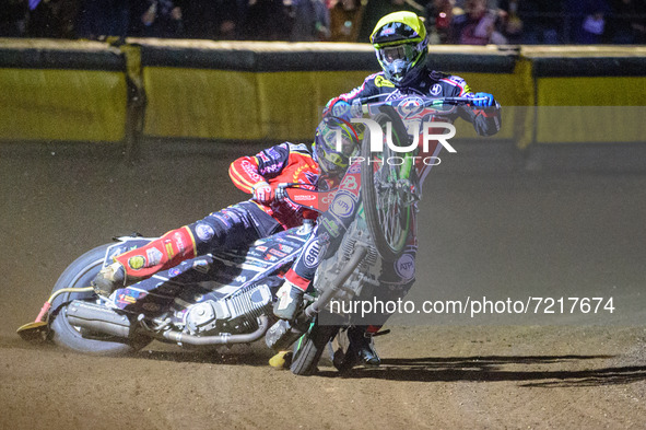 
Charles Wright  (Yellow) \rears in front of Scott Nicholls  (Blue) during the SGB Premiership Grand Final 2nd leg between Peterborough and...