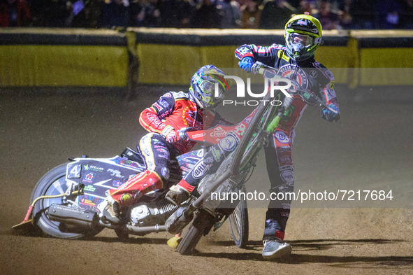 
Charles Wright  (Yellow) \rears in front of Scott Nicholls  (Blue) during the SGB Premiership Grand Final 2nd leg between Peterborough and...