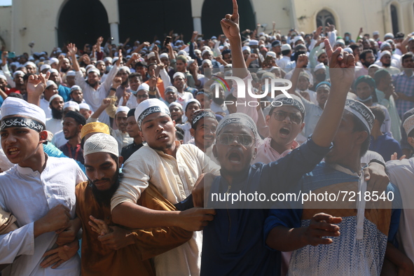 Muslims devotees demonstrate in front of National Mosque during a protest over demeaning of the Holy Quran in Cumilla, in Dhaka, Bangladesh...