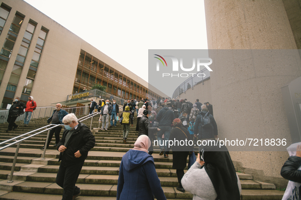 people are seen entering the mosque during the protest over city decision allowing broadcasting the call for prayer at Cologne central mosqu...