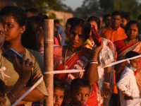 Women and children looking immersion of  idol of the Hindu Goddess Durga on the last day of Durga Puja Festival on October 15, 2021 in Barpe...
