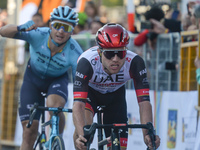 Marc Hirschi (R) of Switzerland and UAE-Team Emirates takes the second place ahead of Jhonatan Restrepo of Colombia and Androni Giocattoli -...