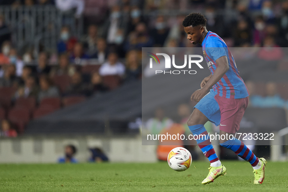Ansu Fati of Barcelona in action during the La Liga Santander match between FC Barcelona and Valencia CF at Camp Nou on October 17, 2021 in...