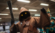 A Star Wars fan wears a costume of a JAWA character during the fourth day of the SOFA (Sal...