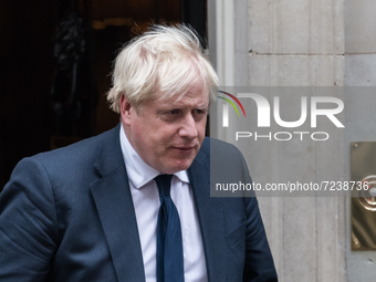 LONDON, UNITED KINGDOM - OCTOBER 18, 2021: British Prime Minister Boris Johnson leaves 10 Downing Street for the House of Commons to lead tr...