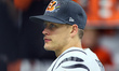 Cincinnati Bengals quarterback Joe Burrow (9) walks off the field after an NFL football ga...