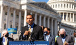 Rev. Adam Taylor, president of Sojourners, speaks during a press conference by House Speak...